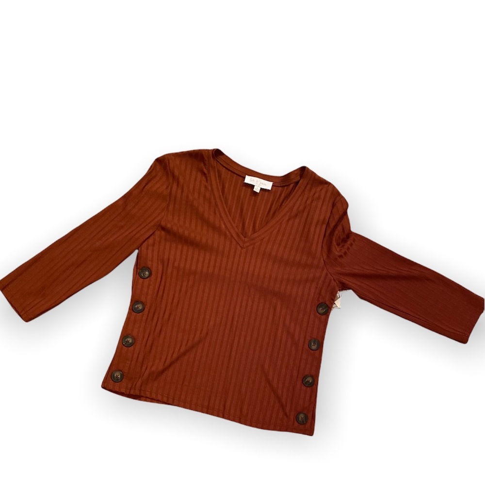 Quarter sleeve blouse. Rust colored from Love & Piece Collective from Dillard’s